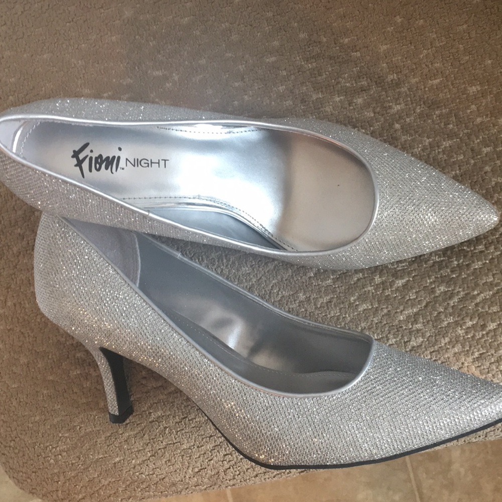Size 11 silver heels worn maybe once or twice.